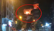 Yenişehir'deki 4 katlı binanın çatısında gece vakti çıkan yangın paniğe yol açtı