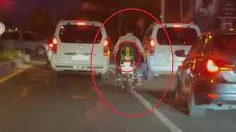 Diyarbakır'da motosiklet sürücüsü kaskın yerini şaşırdı: Arkasına bağlamayı tercih etti