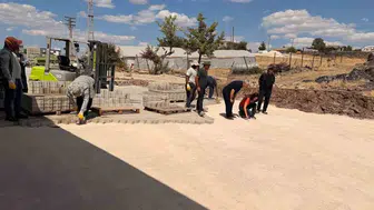 Çermik'in kırsal mahallelerinde ulaşım hamlesi Yollar parke taşıyla yenileniyor