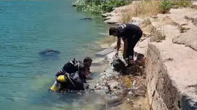 Eğil’de baraj gölünde dalgıçlarla temizlik operasyonu