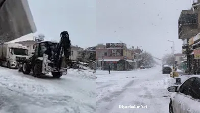 Dicle'de kar mücadelesi: Yokuşta mahsur kalan TIR'a müdahale