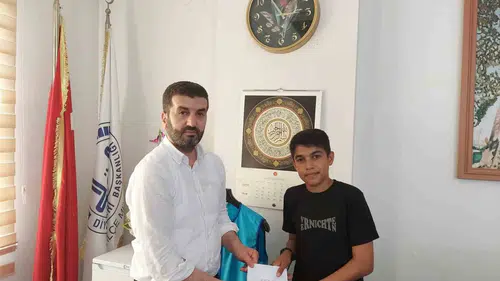 Çermik'te Diyanet'in bilgi yarışmasında dereceye giren öğrencilere ödülleri verildi